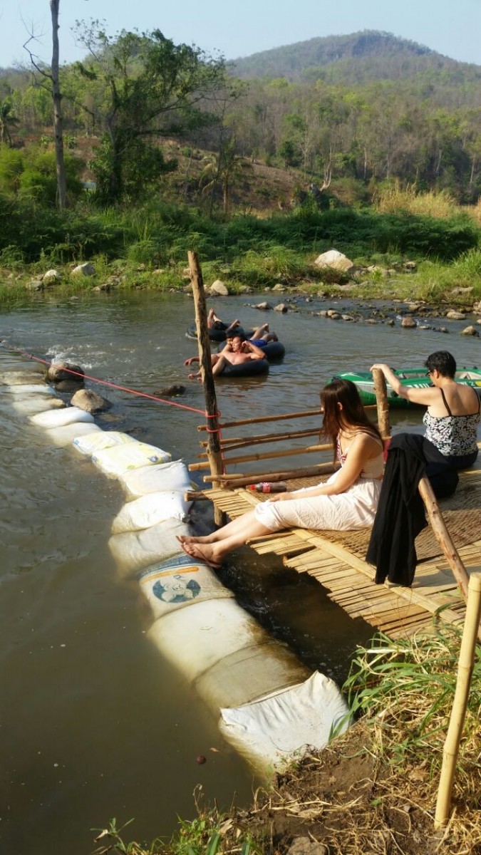 Having Fun in the Bamboo Bridge River In Pai
